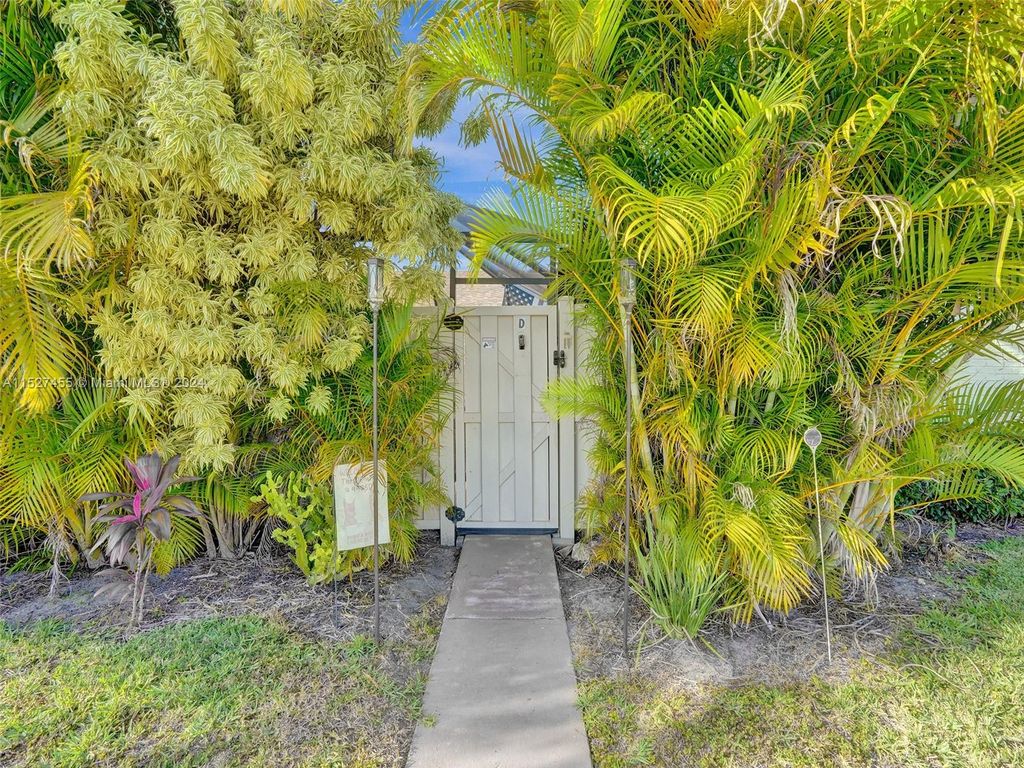 Photo of 9975 Boca Gardens Trl #D, Boca Raton, FL 33496 (MLS # A11527455)