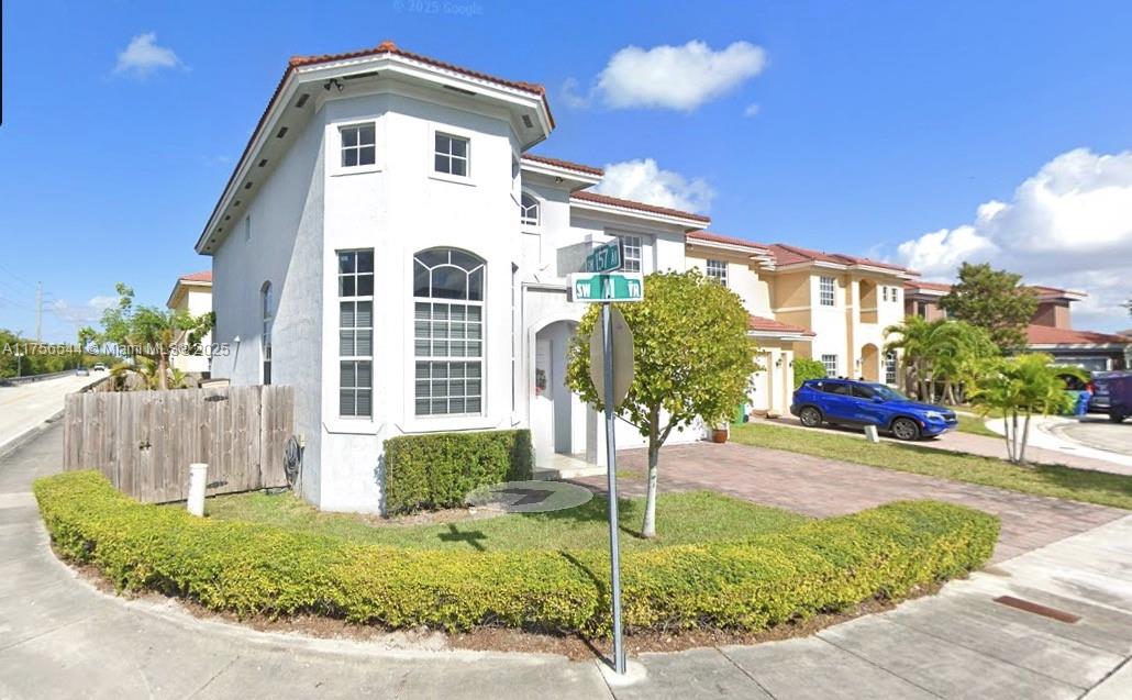 Beautiful NEWLY constructed elegant and contemporary 4 bedroom /3 bathroom home. Corner lot. Grand 14ft ceiling. Dazzling porcelain floors, featuring modern touches, top of the line appliances, walk-in closets, no details were spared. This a family-friendly enclave in an ideal location near the FL Turnpike, restaurants, shopping outlets and A+ school.