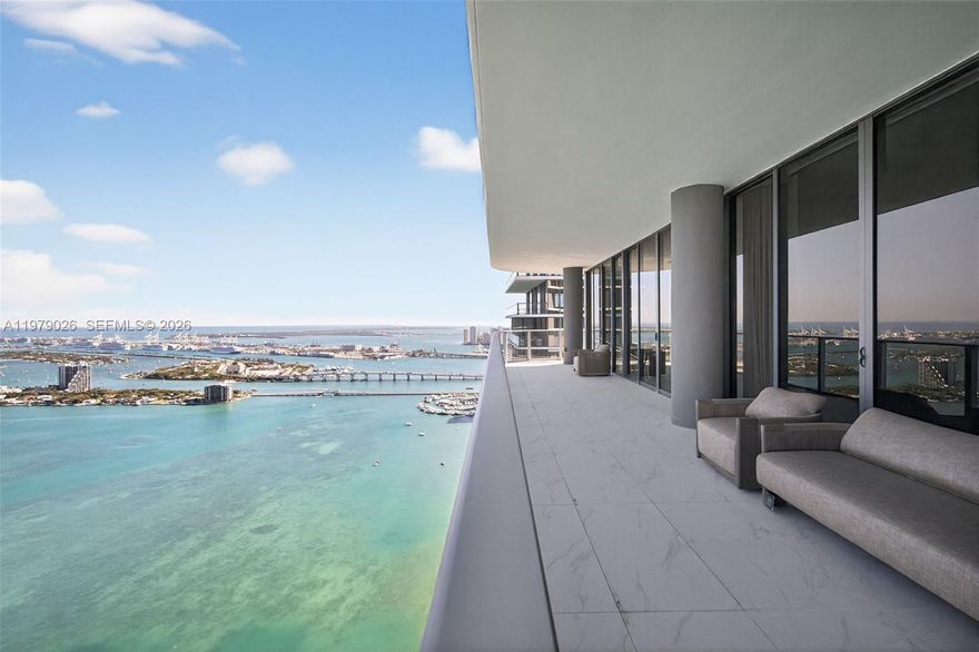 Stunning designer-furnished penthouse with breathtaking panoramic views of Biscayne Bay and the Miami skyline. This residence features floor-to-ceiling windows, soaring ceilings, and expansive terraces that create a seamless indoor-outdoor living experience. The home is beautifully appointed with high-end designer finishes, custom details, and premium furnishings throughout.

The modern kitchen includes top-of-the-line appliances and elegant stone countertops, while the spacious bedrooms and spa-inspired bathrooms offer comfort and sophistication. Residents enjoy world-class amenities including resort-style pools, fitness center, spa, waterfront lounges, and 24-hour concierge.

A rare opportunity to live in a fully furnished luxury penthouse in one of Miami’s most prestigious waterfront buildings.