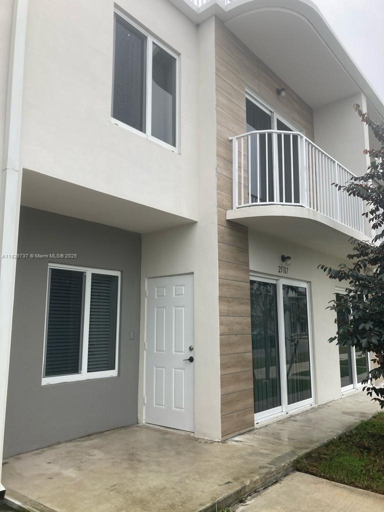 BEAUTIFULL Townhouse 4 bedrooms 3.5 baths. Concrete structure, impact windows & doors, porcelain tile on all areas. Modern open kitchen with stainless steel appliances, quartz counter top & wood cabinets. The owner's suite has built-in walk-in closet on the first floor. Second floor with master, walk-in, washer & dryer included. tankless water heater, balcony. This home has a beautiful large sky view terrace where you can enjoy an outdoor living! Easy access to Turnpike and US1. Builder warranty included, Low HOA fees!