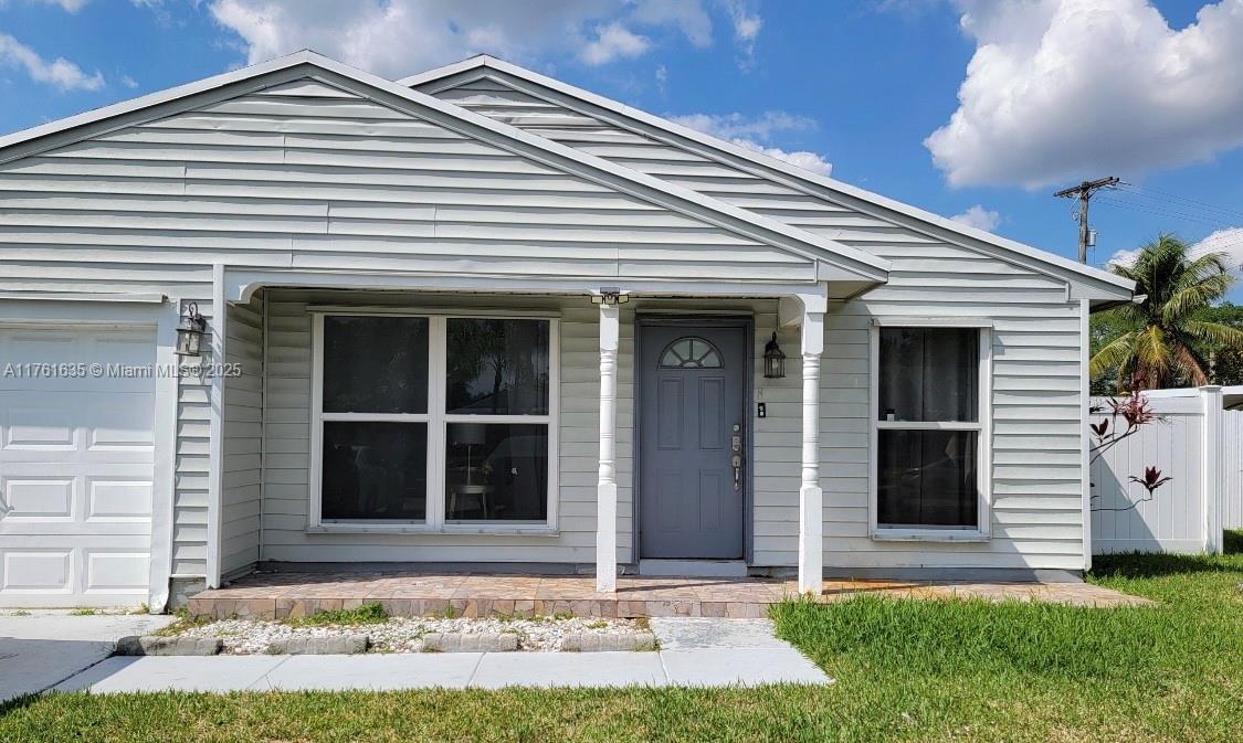 $62,000 PRICE DROP! Amazing Value Single Family Home in Miramar with Three Bedrooms, Two Full Bathrooms, One Car Garage and Extended Carport with room for more than Several Cars. This Rare Home offers a Very Spacious Backyard (7,451 Sq. Ft. Lot) with Room for a Pool! Upgrades include New Impact Windows, New Fence, Tankless Water Heater and Security System! Breakfast Area with Living/Dining Space featuring Granite Counter Kitchen & White Cabinetry. Walking Distance to Public Transportation and a Short Drive to Golf & Tennis, Walmart, Sam's Club, Restaurant, Park, House of Worship and Turnpike. Cash Offers Only. Don't miss this Opportunity!