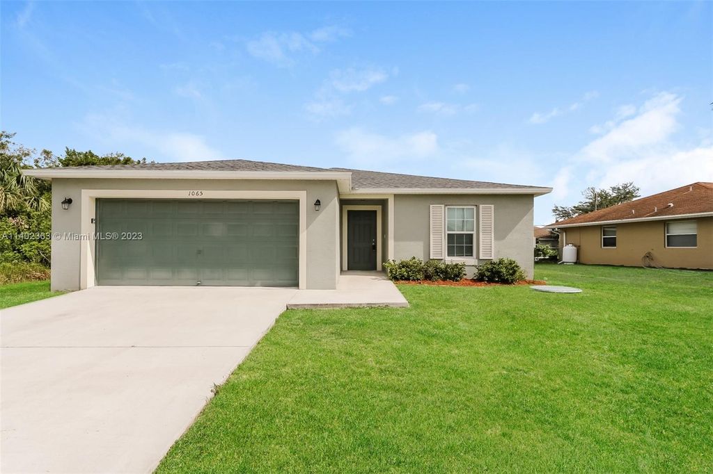 Photo of 1065 SW Canary Ter, Port Saint Lucie, FL 34953 (MLS # A11402363)