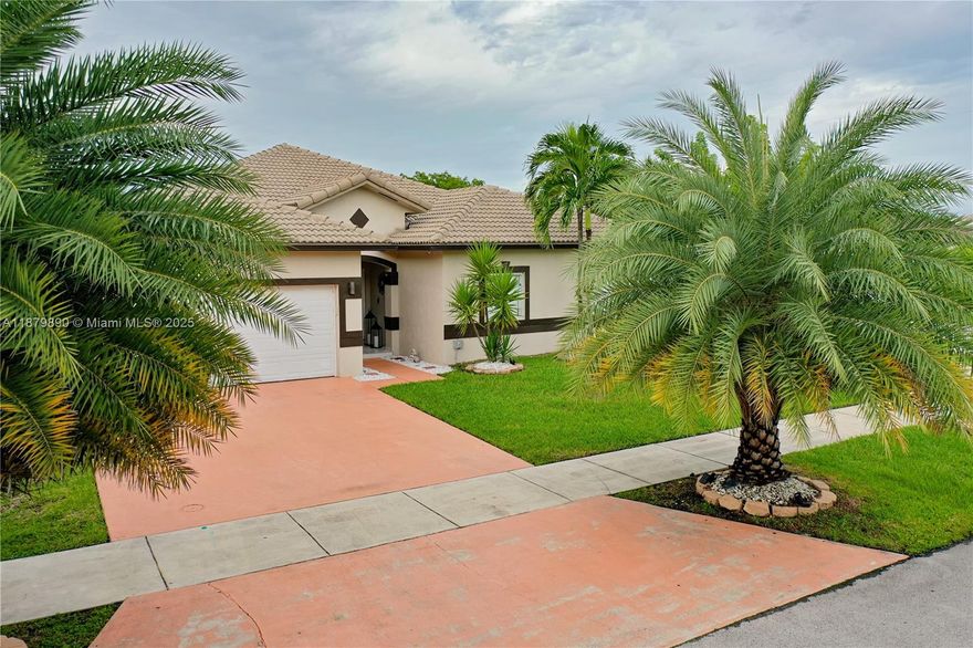 Modern Homestead Home with Solar, Guest Suite & Big Yard! Welcome to this beautifully remodeled 4-bedroom, 2-bath home in the heart of Homestead, featuring a rare open-concept layout filled with natural light. Modern finishes, a brand-new AC, and energy-saving solar panels make this property as practical as it is stylish,  move-in ready with lower monthly bills. The spacious 7,537 sq ft lot offers endless possibilities for family gatherings, gardening, or even adding a pool. With no HOA, multiple parking spaces, and a large private yard, you’ll enjoy true flexibility and freedom.The garage has been thoughtfully converted into a full efficiency suite, providing the perfect setup for extended family, guests, or potential rental income. Note: Garage Conversion Details in seller’s disclosure.
