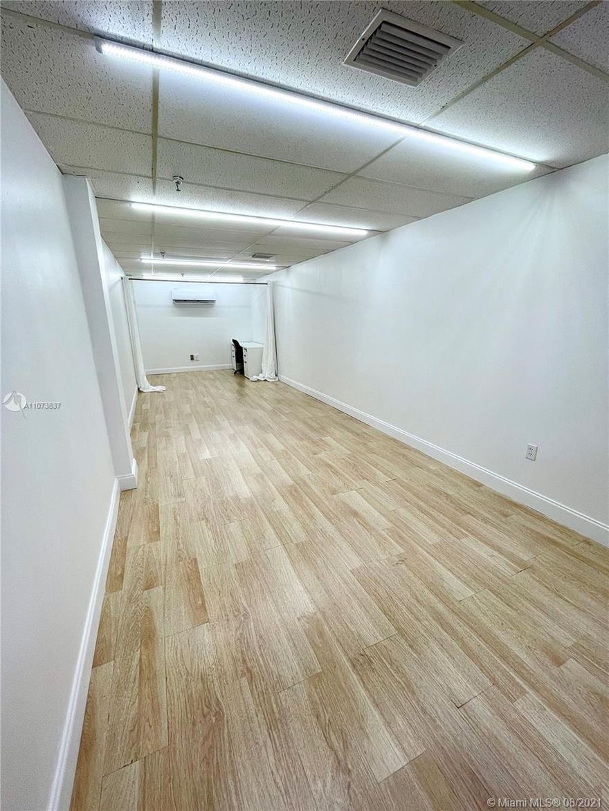 Fantastic Unit located on first floor of Miami Merchandise Mart, 278 sq ft unit. 
Rent includes sales tax, electricity and security, with option to renew at 3% per year. Wood floorings, LED lights, white interior and seperate AC Unit. 1 assigned parking spot/ monthly fee