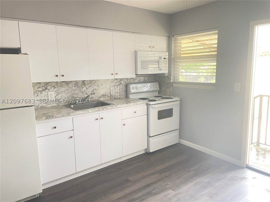 Photo of 1119 N 22nd Ave #1119, Hollywood, FL 33020 (MLS # A12097683)