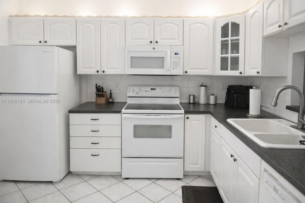 Photo of 1800 SW 81st Ave #1411, North Lauderdale, FL 33068 (MLS # A11936120)