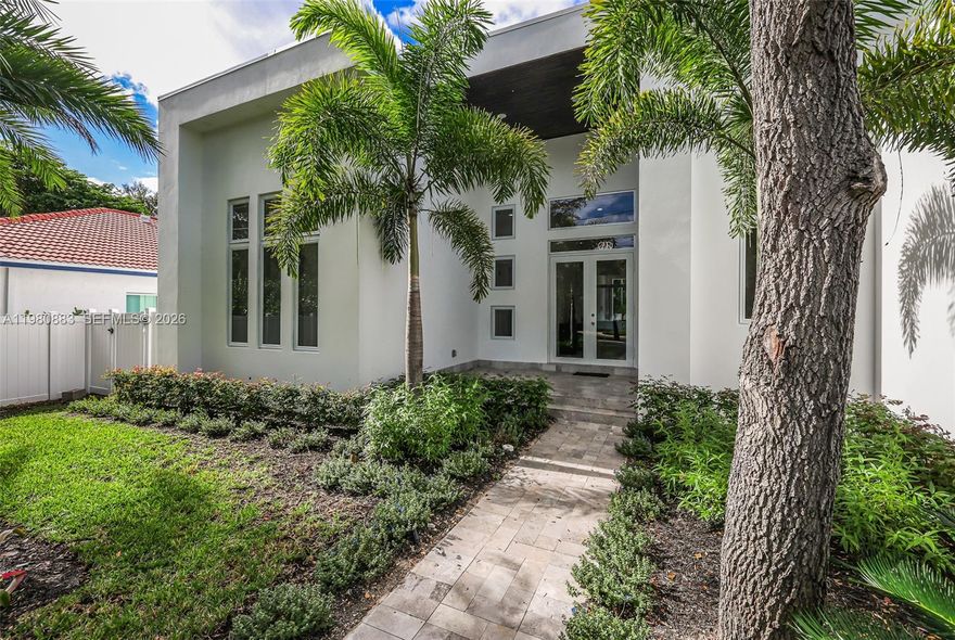 Outstanding new modern one story home in Biscayne Park. High end finishes throughout. Open kitchen with large cooking island, quartz countertops, Miele appliances, separate spacious pantry. Dual tone kitchen cabinets. The home features high ceilings, impact windows and doors, porcelain flooring, Indigo custom doors. Trane AC units.          Private backyard with covered patio, pool and spa/hot tub. Split plan 4 bedrooms, walk-in closets, large laundry room, 2 car garage. Close to Miami Design District, Bal Harbour Shops, Miami Country Day school, shopping plazas. Easy access to major highways.