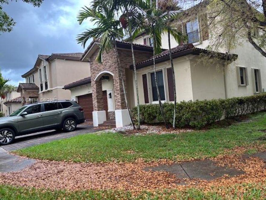 Welcome to this expansive 5BR/3BA residence in the highly desirable Enclave at Black Point Marina. This home offers room to live, work, and entertain. The first-floor bedroom and full bath provide flexibility for guests or a private office. Natural light fills the open living and dining areas, leading to a spacious kitchen with stainless steel appliances, wood cabinetry, and a cozy breakfast nook. Upstairs, unwind in the oversized primary suite with a generous walk-in closet. Three additional bedrooms offer plenty of space for family or hobbies. Tile flooring throughout make maintenance a breeze. Step outside to enjoy a corner lot large patio all fence perfect for entertainment and build your own pool.