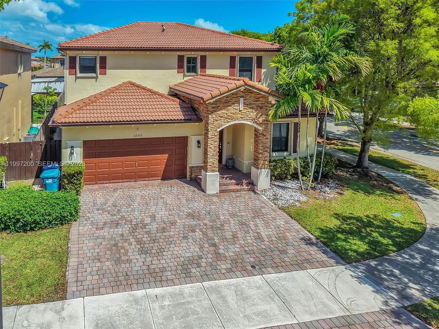 Welcome to this expansive 5BR/3BA residence in the highly desirable Enclave at Black Point Marina. This home offers room to live, work, and entertain. The first-floor bedroom and full bath provide flexibility for guests or a private office. Natural light fills the open living and dining areas, leading to a spacious kitchen with stainless steel appliances, wood cabinetry, and a cozy breakfast nook. Upstairs, unwind in the oversized primary suite with a generous walk-in closet. Three additional bedrooms offer plenty of space for family or hobbies. Tile flooring throughout make maintenance a breeze. Step outside to enjoy a corner lot large patio all fence perfect for entertainment and build your own pool.