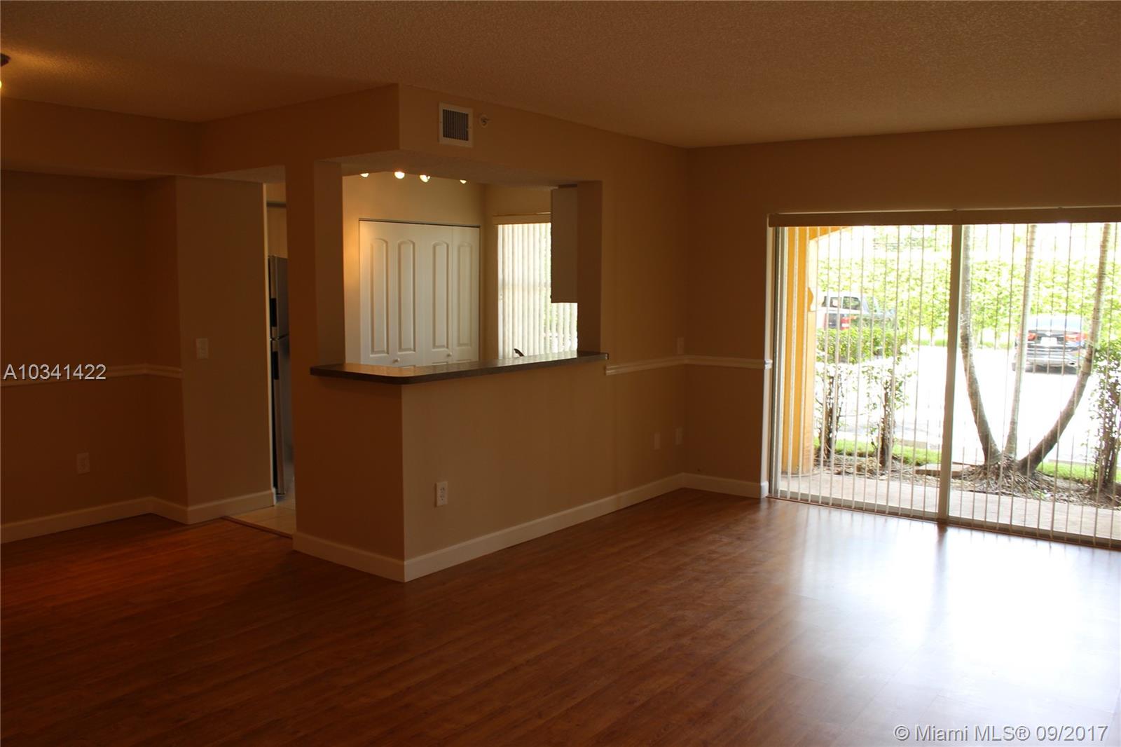 Spacious 2/2 condo with tile and wood laminate flooring and stainless steel appliances. This condo is on the first/ground floor, comes with washer & dryer in unit and has two assigned parking spaces including a covered space. La Via is a well-maintained gated community and its amenities include guard gate, clubhouse, pool and spa, billiards, tennis, children’s playground and fitness center. Don’t miss out on this great condo in the heart of Pembroke Pines. Water is not included in rent.