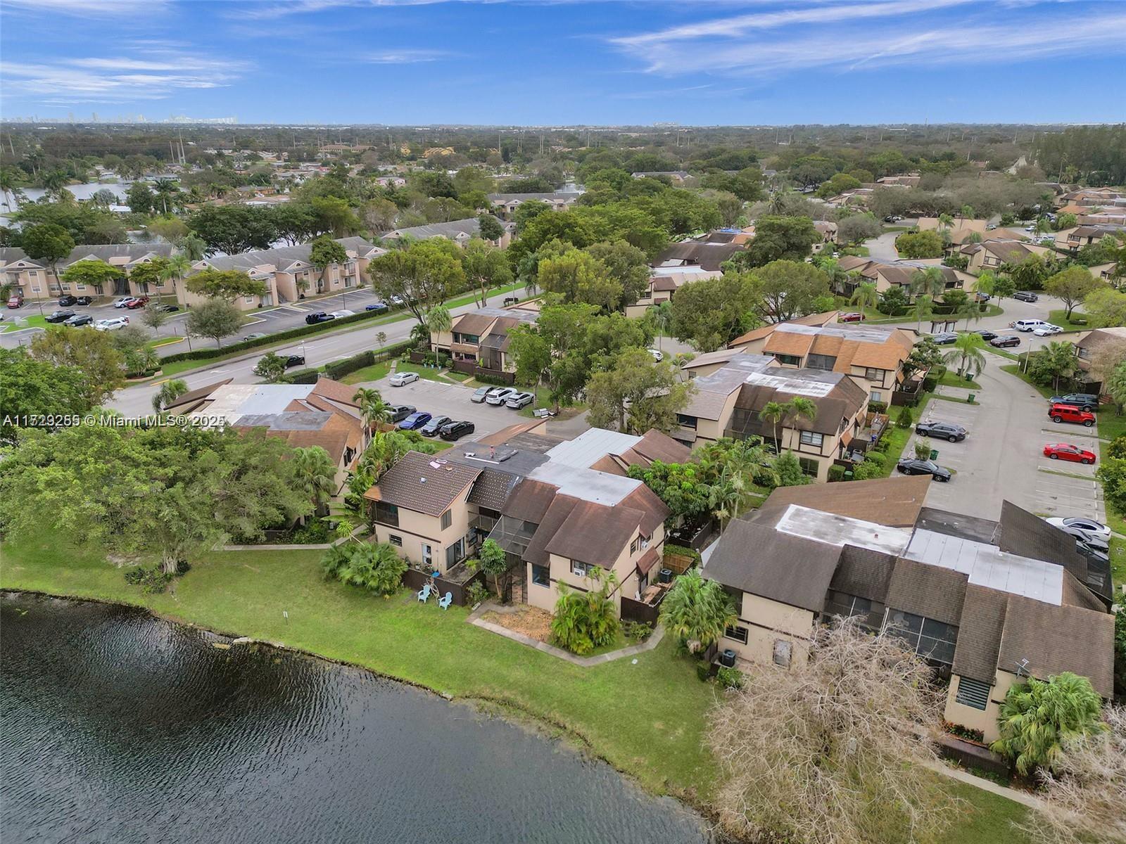 HUGE PRICE REDUCTION!! Beautiful and fully renovated single family townhouse that is NOT in a "condo" association! 5% MINIMUM DOWN NEEDED! Brand new Roof,brand new wood flooring,updated bathrooms.This house has lovely lake view with huge patio and balcony on second floor.No application process or application fee!! Small monthly fee includes cable..Upstairs,three bedrooms with private balconies and two and half elegantly updated bathrooms.This house is steps from pool.. Enjoy seamless indoor-outdoor transitions with sliding doors that lead from the living room to a tranquil patio.Close to great schools!Take advantage of nearby playground, pool,basketball court!The unit boasts one of the largest floor plans in the community as well as having a water front view.schedule your showing today.