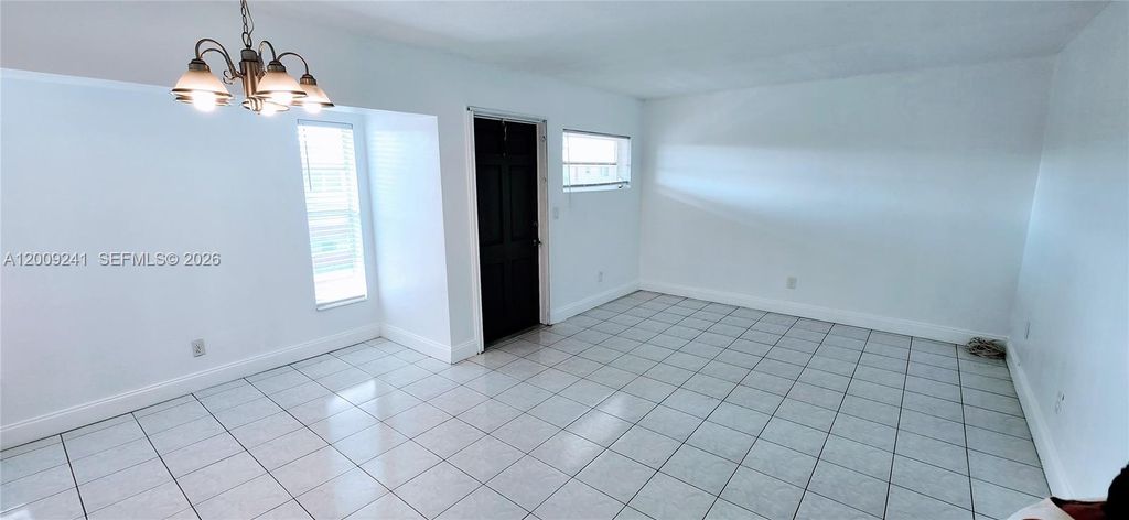 Photo of 2980 NW 43rd Ter #203, Lauderdale Lakes, FL 33313 (MLS # A12009241)