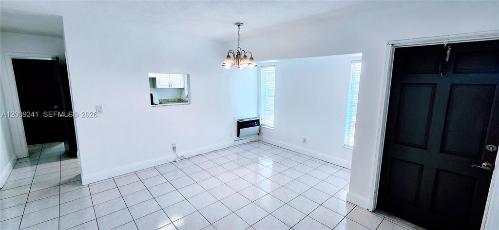 Photo of 2980 NW 43rd Ter #203, Lauderdale Lakes, FL 33313 (MLS # A12009241)