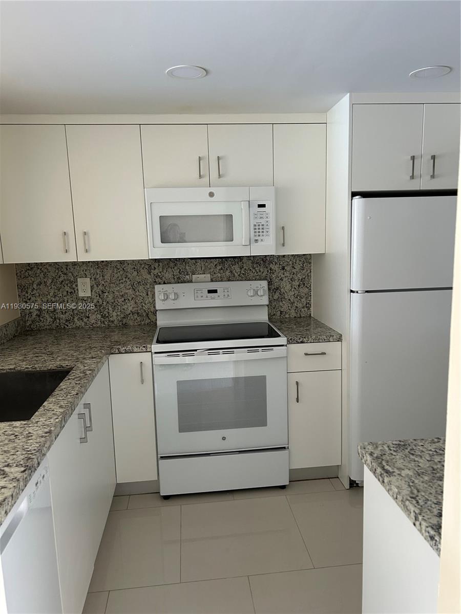 VERSAILLES GARDENS CONDO - Residential Lease