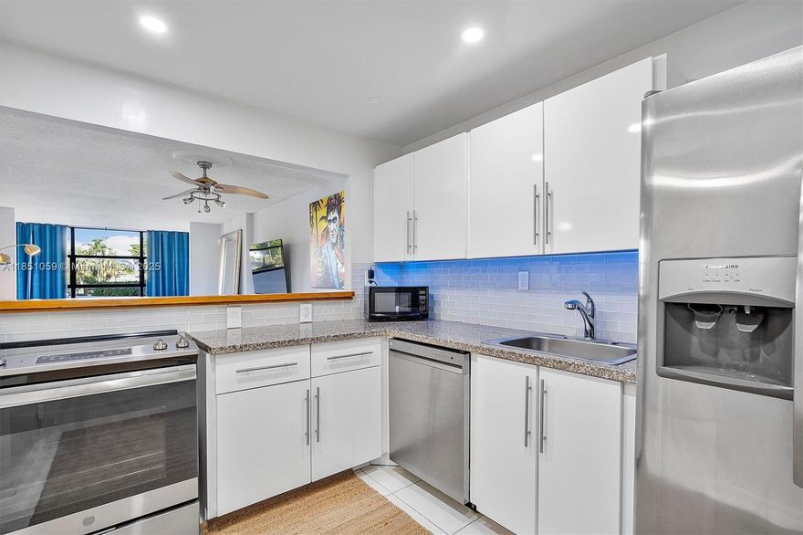 JUST REDUCED! Owner is ready to sell. Updated condo features an open kitchen with stainless steel appliances, sunlit living space, and a spacious bedroom with walk-in closet. Enjoy resort-style amenities: gym, yoga & boxing studio, heated Intracoastal pool, tennis courts, and clubhouse. 40-year completed. Minutes drive to shops, dining, Gulfstream casino, and the beach. Easy to show—call today!