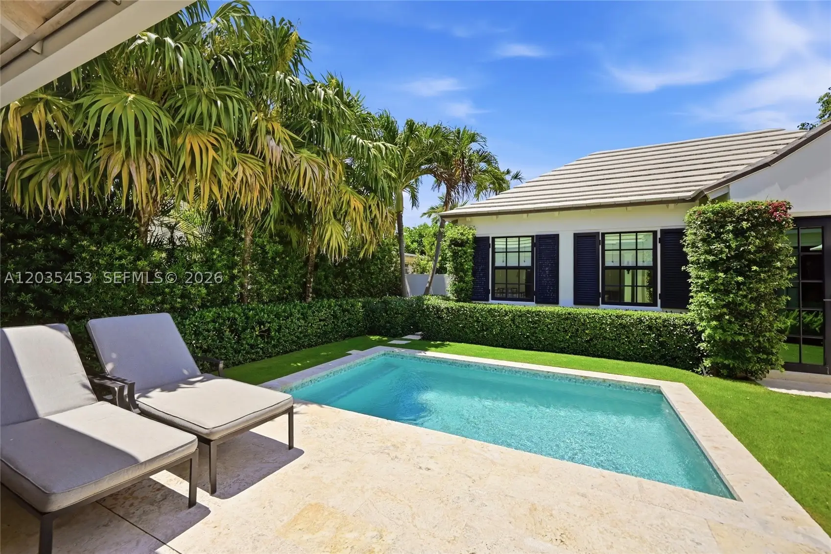 Located on the coveted ocean block of Chilean Avenue, this like-new Be – image 19