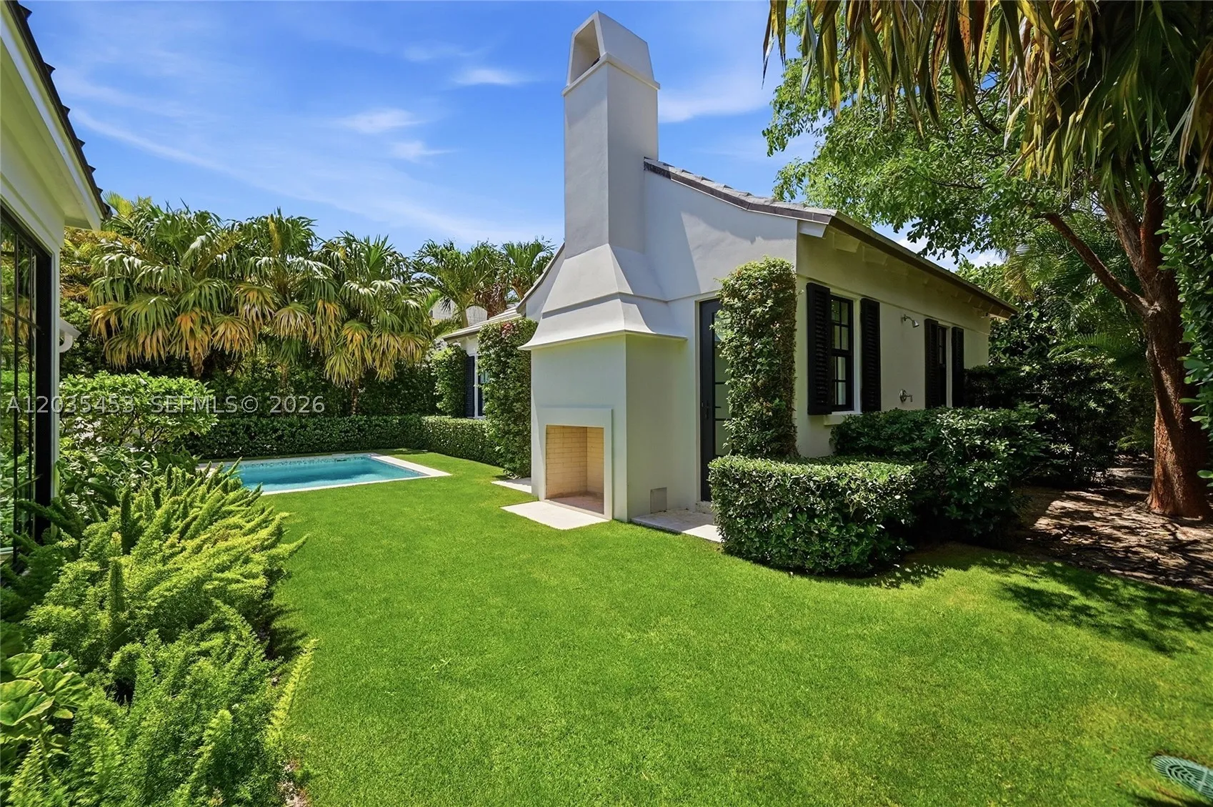 Located on the coveted ocean block of Chilean Avenue, this like-new Be – image 20