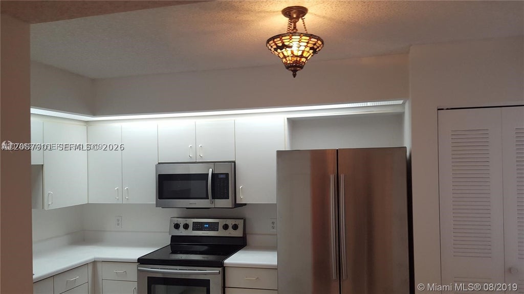 Photo of 1650 SW 124th Ter #204D, Pembroke Pines, FL 33027 (MLS # A12087901)