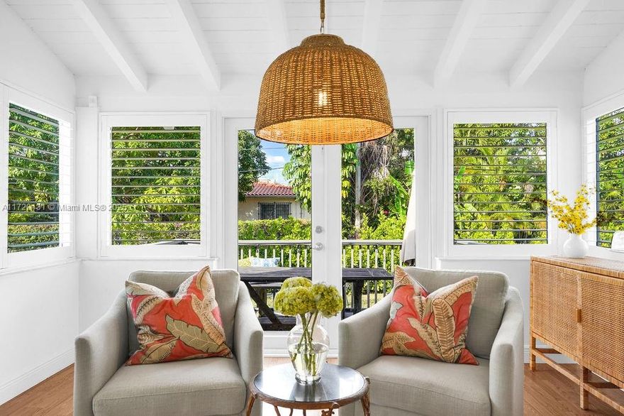 Discover this delightful midcentury modern home in Coral Gables, where classic charm meets contemporary updates. The residence features timeless wood floors and a bright Florida room. Modern enhancements include impact windows, an updated bathroom, and PVC plumbing. Situated on an oversized lot, there's ample space for a pool or future expansion, plus the convenience of a garage. Enjoy the vibrant lifestyle with just a short stroll to The Plaza, high end restaurants, shops, and all the excitement that Coral Gables has to offer.