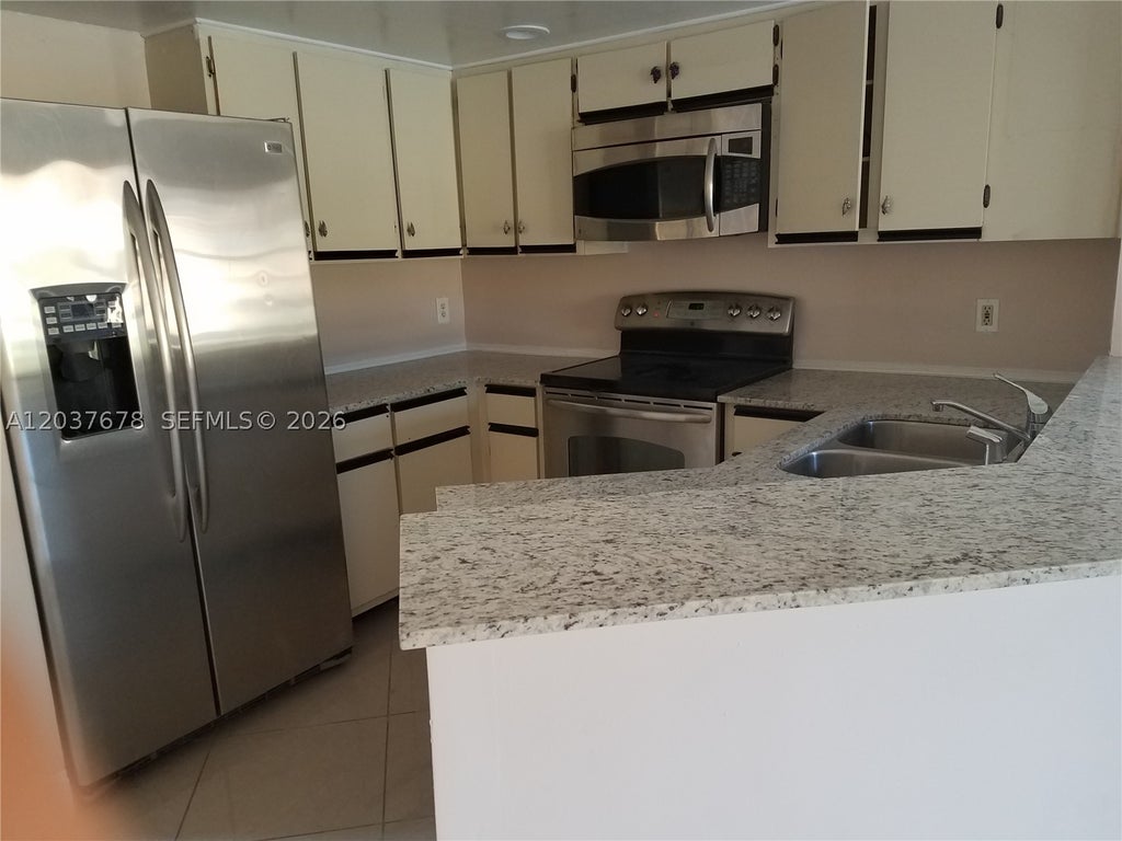 Photo of 5200 NW 31st Ave #150, Fort Lauderdale, FL 33309 (MLS # A12037678)