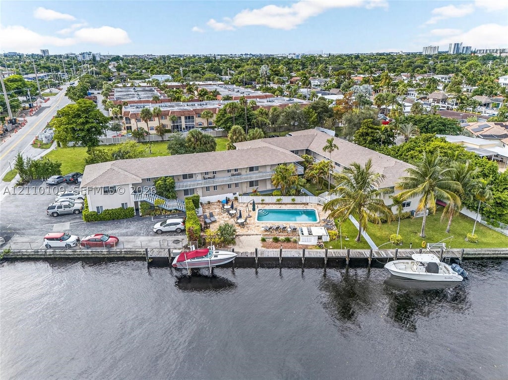 Photo of 199 E Mcnab Rd #101, Pompano Beach, FL 33060 (MLS # A12110109)