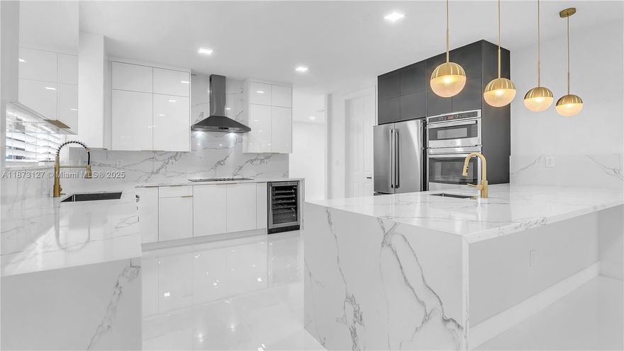 Welcome to this beautifully renovated 5-bedroom, 4.5-bath residence with over 4,294 SQFT of total construction in the exclusive Cutler Cay community. NEW European kitchen design frameless cabinets. The Gourmet kitchen is spacious and modern, overlooking a spacious family room, with TWO sinks, a 36" and a second bar/preparation Sink, NEW quartz countertops with three waterfalls, NEW SS appliances, A double oven, A walk-in pantry, just perfect for gatherings and enjoying the culinary art, NEW floors, NEW bathrooms, NEW light fixtures, overlooking a spacious family room. Stunning master bedroom with two walk-in closets, a HUGE SPA master bath with two showers. A bedroom and full bath on the first floor. 2-car Garage. Fenced patio. Incl: alarm, Internet, cable, Clubhouse w/GYM & Pool