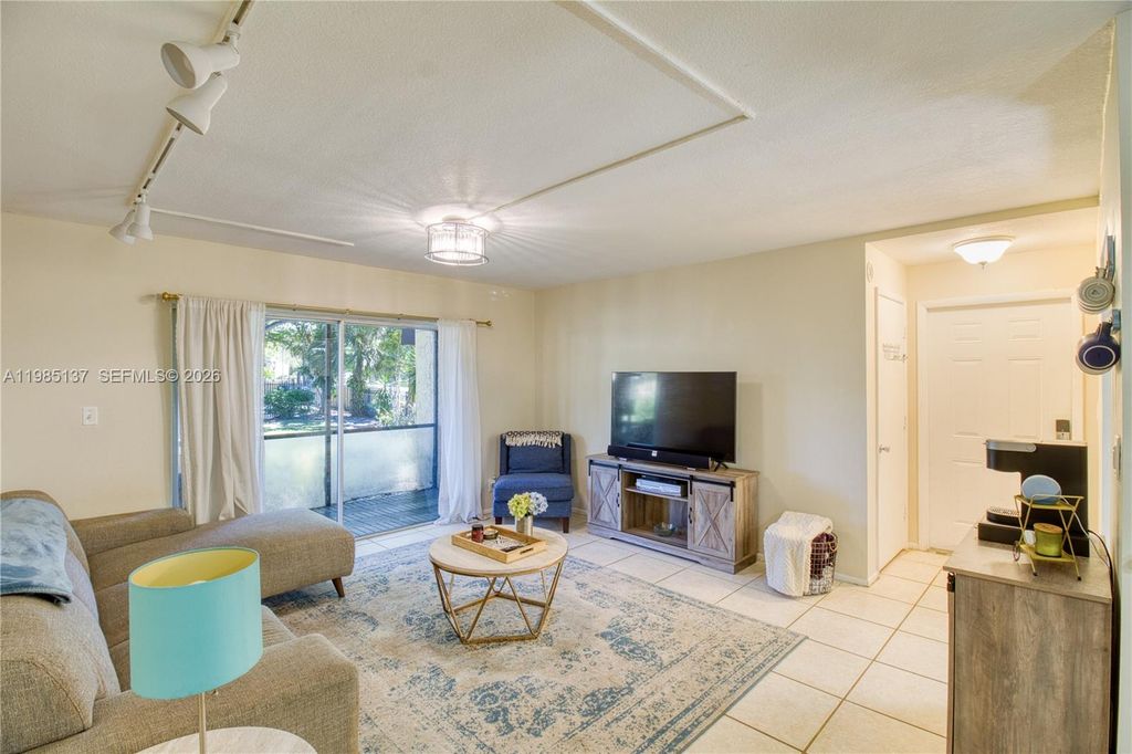 Photo of 3095 N Oakland Forest Dr #104, Oakland Park, FL 33309 (MLS # A11985137)