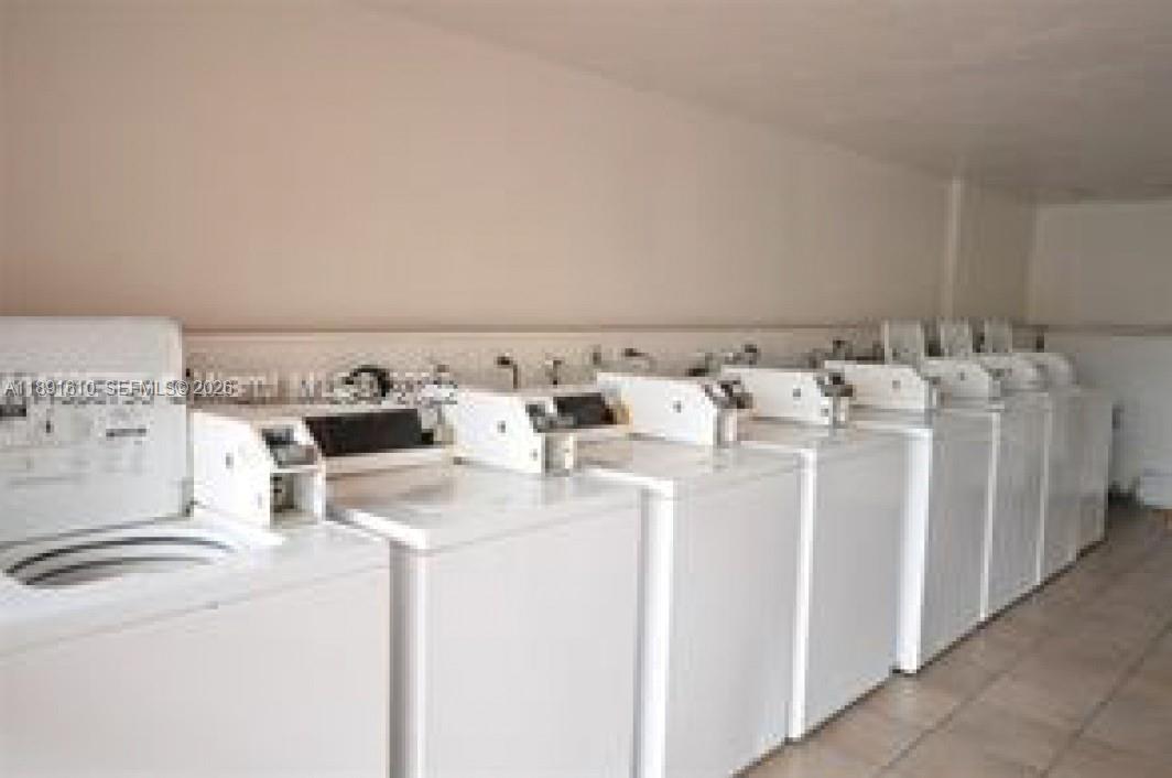 NEW WORLD CONDO APTS III - Residential