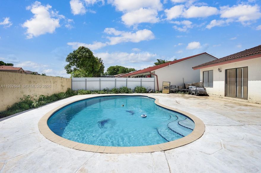 Spacious 4-bedroom, 2-bath single-family home located in the desirable Sugarwood community in Kendall. Situated within an open-gate community, this residence offers a functional floor plan with generous living areas and natural light throughout. Tile flooring throughout, brand-new roof, and freshly painted. Private backyard with pool, ideal for entertaining. Located in a well-maintained, established community near top-rated schools, shopping, dining, and major highways. A great opportunity to own in a highly desirable area.