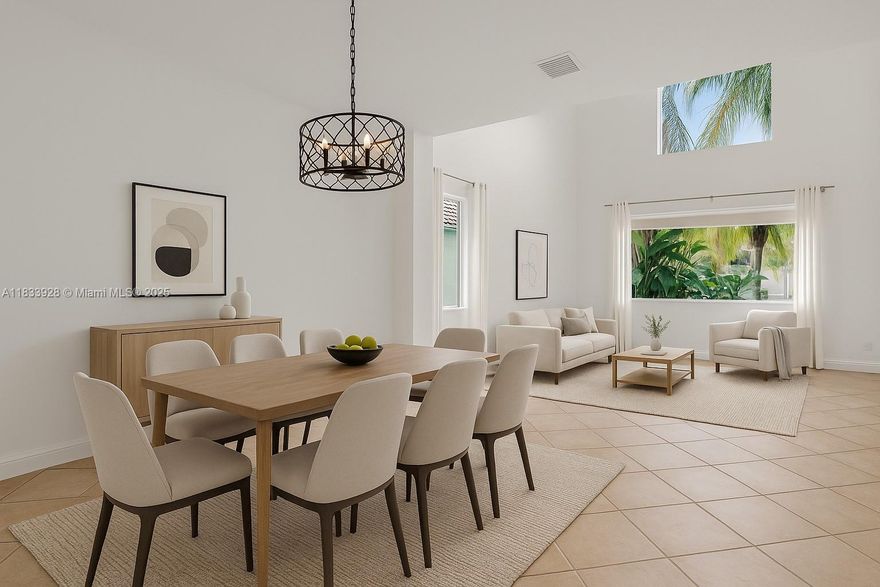 NEW IMPACT  WINDOWS & DOORS, NEWER ROOF(2018)! Beautifully updated 5-bedroom +loft, 3.5 Bathroom, 2 Car Garage lakefront home featuring all freshly painted interior, & a spacious backyard w/ mature trees w/ more than enough room for a pool (over $100,000.00 in upgrades!). The kitchen boasts granite counter tops as well as dual-tone wood cabinets, custom hood, & stainless appliances. A/C (2022), water heater (2021), solar patio screens, remodeled bathrooms & an enclosed Impact Glass Sunroom that offers serene lake views & seamless indoor-outdoor living. The primary bath has travertine, wood cabinetry, dual sinks, & a rainfall shower. A wonderful opportunity to live in the highly desired community of The Lakes offering a clubhouse + pool, close to A+ schools, shops, dining & major highways.