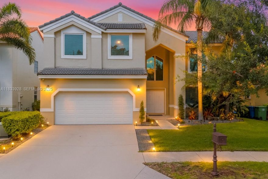 NEW IMPACT  WINDOWS & DOORS, NEWER ROOF(2018)! Beautifully updated 5-bedroom +loft, 3.5 Bathroom, 2 Car Garage lakefront home featuring all freshly painted interior, & a spacious backyard w/ mature trees w/ more than enough room for a pool. The kitchen boasts granite counter tops as well as dual-tone wood cabinets, custom hood, & stainless appliances. A/C (2022), water heater (2021), solar patio screens, remodeled bathrooms & an enclosed Impact Glass Sunroom that offers serene lake views & seamless indoor-outdoor living. The primary bath has travertine, wood cabinetry, dual sinks, & a rainfall shower. A wonderful opportunity to live in the highly desired community of The Lakes offering a clubhouse + pool, close to A+ schools. RARE VALUE FOR A TRUE 5 BEDROOM HOME ON THE LAKE IN THE LAKES!