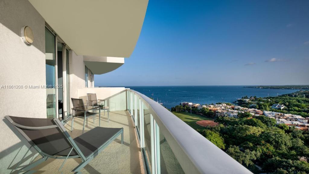 Discover the perfect blend of luxury, lifestyle, and convenience in this 2-bedroom, 2-and-a-half bath residence offering breathtaking panoramic views of Biscayne Bay. Situated in a full-service condo hotel, this property provides the ideal opportunity for both personal enjoyment and investment—with no rental restrictions.
Step outside and find yourself in the heart of Coconut Grove, just moments from world-class dining, sailing venues, the yacht club, nightlife, and the charming village atmosphere makes this area so desirable.
The building offers resort-style amenities and full services, ensuring comfort, convenience, and ease of ownership.2 key flexible floor plan and wrap around balcony.
stunning water and Park views, vibrant surroundings, and every convenience at your doorstep.