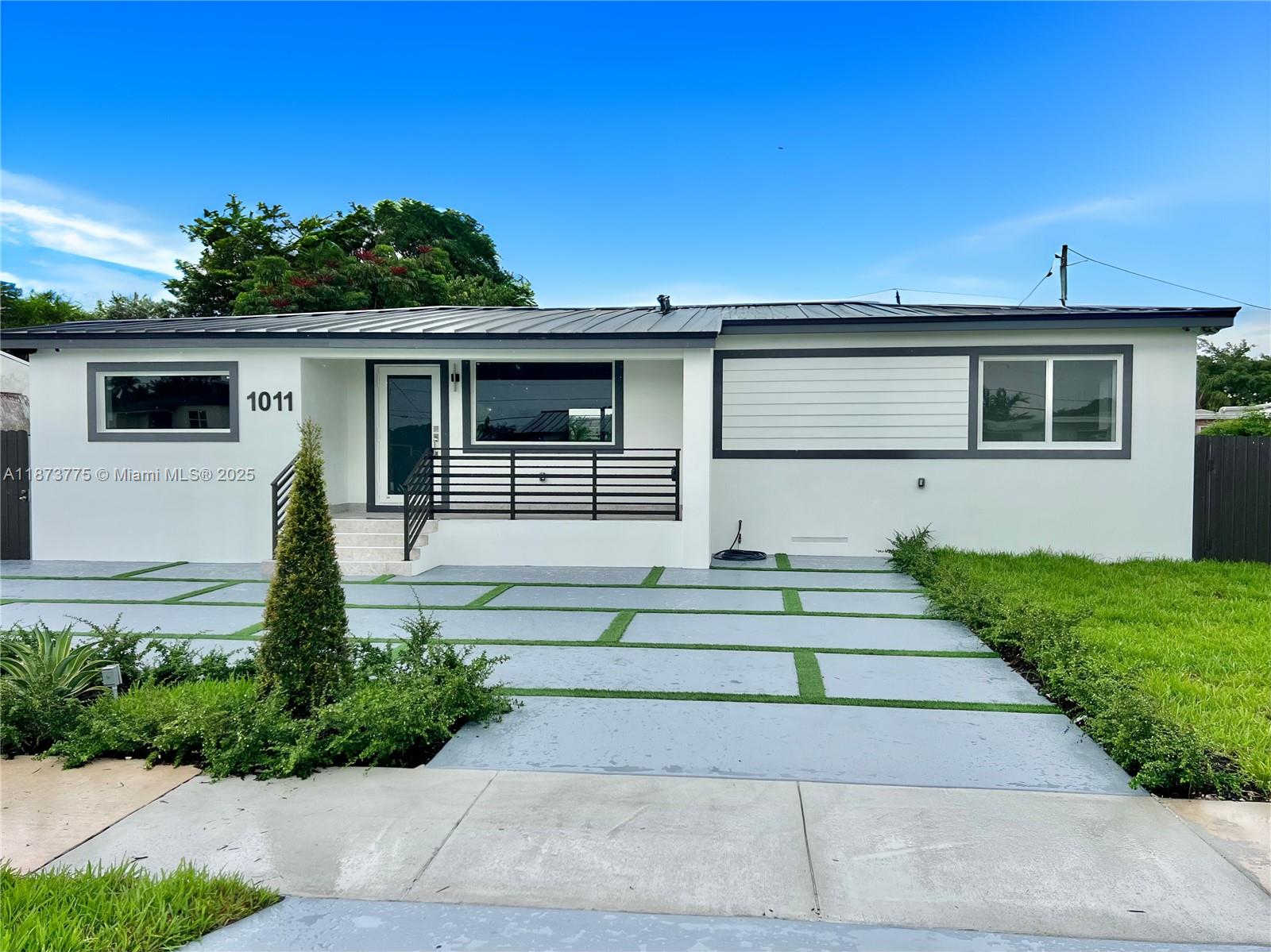 COMPLETELY REMODELED 3 BED/3 BATH HOME WITH DESIGNER DETAILS THROUGHOUT. 1,751 SF UNDER A/C AND 2,091SF TOTAL. NEW PLUMBING, ELECTRICAL, HIGH IMPACT WINDOWS AND DOORS, A/C & METAL ROOF WITH FOAM INSULATION. AMAZING MODERN KITCHEN HAS AN EXTRA LARGE ISLAND W/COOKTOP, QUARTZ COUNTERS, WINE COOLER & SS APPLIANCES. ENTIRE HOUSE HAS 48X48 PORCELAIN TILES & LED LIGHTING. 3 STUNNING BATHS ALL WITH GLASS SHOWER ENCLOSURES & LIGHTED MIRRORS. MODERN PAVED DRIVEWAY WITH TURF, COVERED FRONT PORCH AND REAR TERRACE, OVERSIZED BACKYARD WITH ROOM FOR A POOL OR GUEST HOUSE. SIDE YARD FITS BOAT/RV. THIS INCREDIBLE HOME FEELS LIKE NEW CONSTRUCTION, BUT IS LOCATED IN THE HEART OF MIAMI CLOSE TO EVERYTHING OUR BEAUTIFUL CITY HAS TO OFFER.