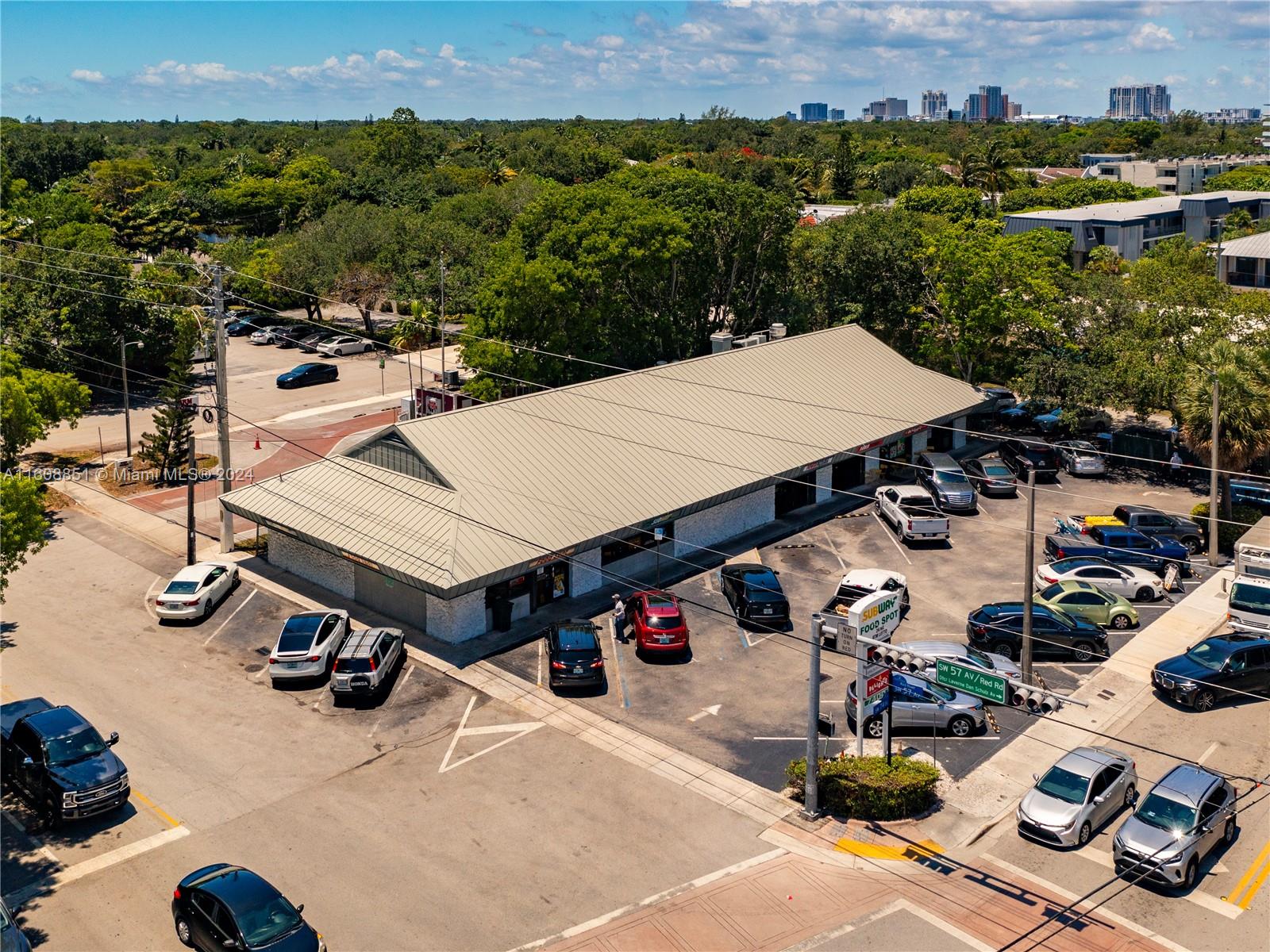 Welcome to an exceptional commercial investment opportunity in the heart of South Miami, an affluent and bustling neighborhood. This prime shopping center, strategically located just three blocks from the upcoming Sunset Place development, offers an unparalleled blend of convenience, visibility, and foot traffic. Tenants: Power Pizza, Subway, International restaurant and beauty salon. Included in the sale:  The Famous Food Spot a well-established and beloved local eatery known for its diverse menu and loyal customer base, a fully operational and equipped store, providing essential goods and service. Surrounded by new high rises and mixed-use developments, ensuring a steady and growing stream of potential customers.