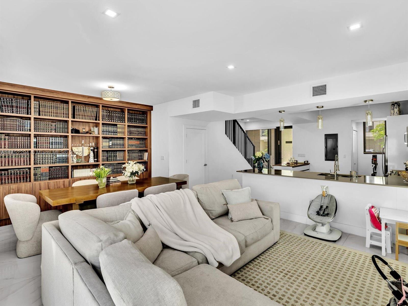 Beautiful 3-bedroom, 2.5-bath townhouse in a gated eco-smart community. Features include hurricane-impact windows and doors, spacious layout, and a 2-car carport. Enjoy access to a community pool and clubhouse. Located in a developing neighborhood—phases 1 & 2 complete, phase 3 underway. Just 15 minutes from the beach, Dania Pointe, and FLL Airport, and only 3 minutes from the Hard Rock Guitar Hotel. Walking distance to houses of worship, grocery stores, top dining spots & schools. Ideal for comfort, convenience, and lifestyle.