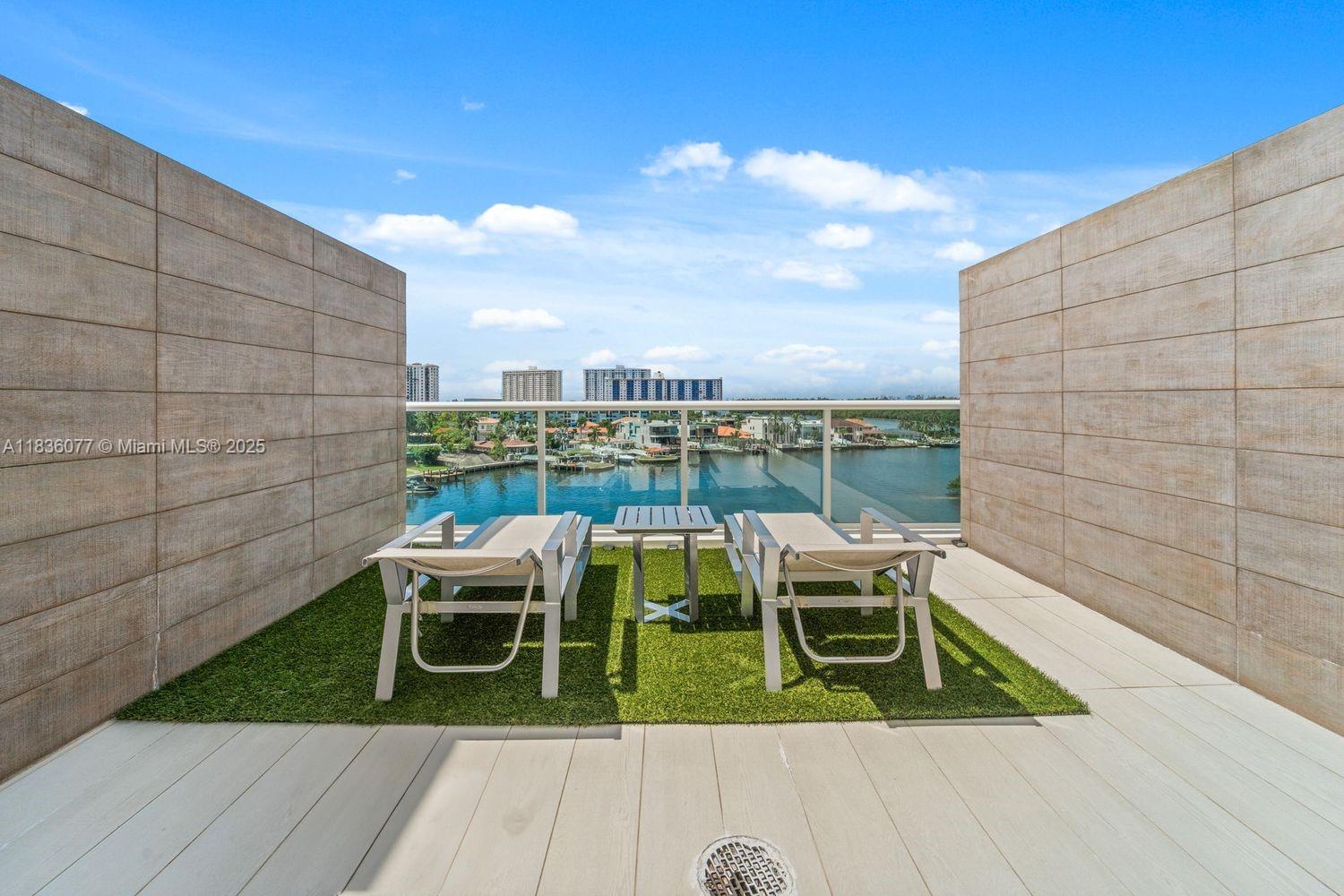 This beautifully curated 1-bedroom + den, 2-bath residence blends refined comfort with panoramic intracoastal views. From every room — and especially the expansive 600 sq ft balcony — enjoy tranquil water vistas that define coastal living. Inside, an open-concept layout showcases a custom kitchen, impact windows, and thoughtful finishes throughout. The flexible den functions seamlessly as a home office or guest space, while two dedicated parking spots and dual storage units offer rare convenience.
Resort-style amenities await: full marina service, valet, spa, steam & sauna, tennis courts, lush landscaped gardens, and a stunning infinity-edge pool with hot tubs. Just a short stroll to the beach, parks, and world-class shopping, this home is perfect for relaxation.