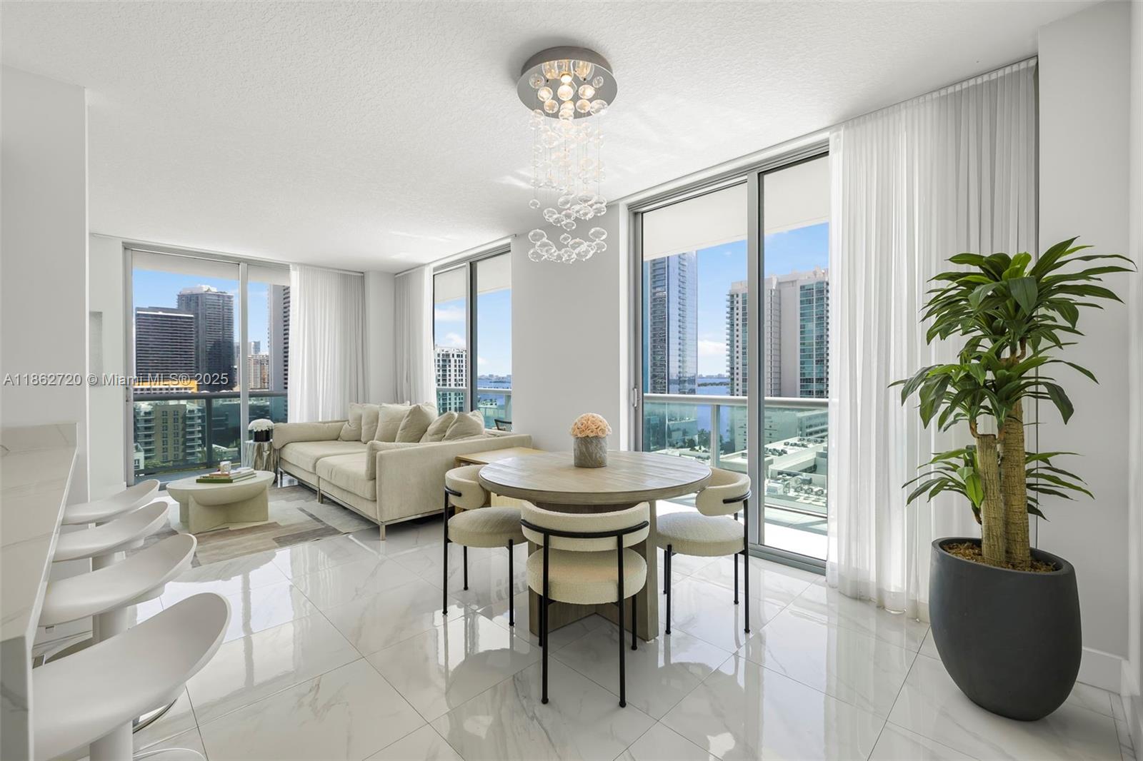 An elegant 2 beds, 2 baths condo featuring 2 balconies with views of Biscayne Bay in the best line in the building. New kitchen, walk-in closets, washer & dryer, blackouts. Living room has access to a wrap around balcony, and the master to a separate balcony. Art Gallery is a boutique building with sauna, gym, club room, 1 assigned parking, a 24-hou rconcierge. Excellent location, Whole Foods near by, Margaret Pace Park. Edgewater is considered one of the best Miami's neighborhoods with a great infrastructure, shops, supermarkets, parks, finest dining in your doorstep!