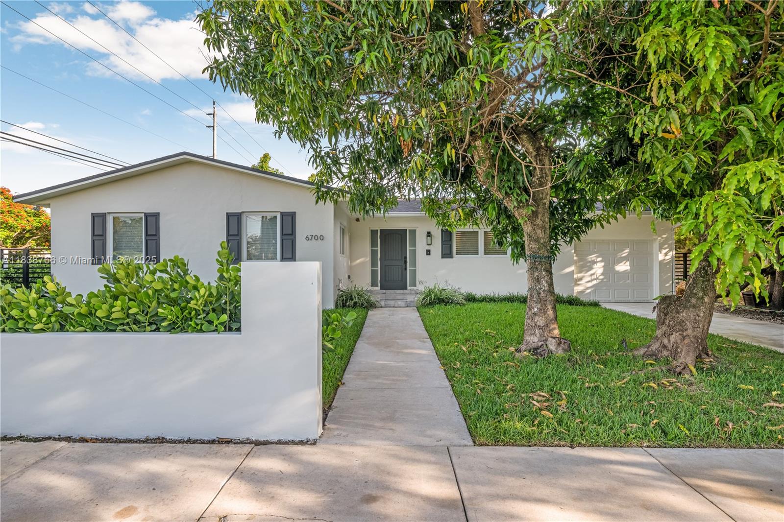 Located in one of the best public school districts in South Miami, this inviting 4-bedroom, 2-bathroom (both fully remodeled and yet to be used), brand new exterior concrete wall + side gates, and impact windows, this house offers a cozy and casual vibe, perfect for anyone looking for comfort and style. With 1,495 square feet of living space, there's plenty of room to spread out and make yourself at home. Sitting on an 8,500 square foot lot, this property has plenty of outdoor space for you to enjoy. Whether it's weekend BBQs or simply relaxing under the Miami sun, the backyard will be your go-to spot.