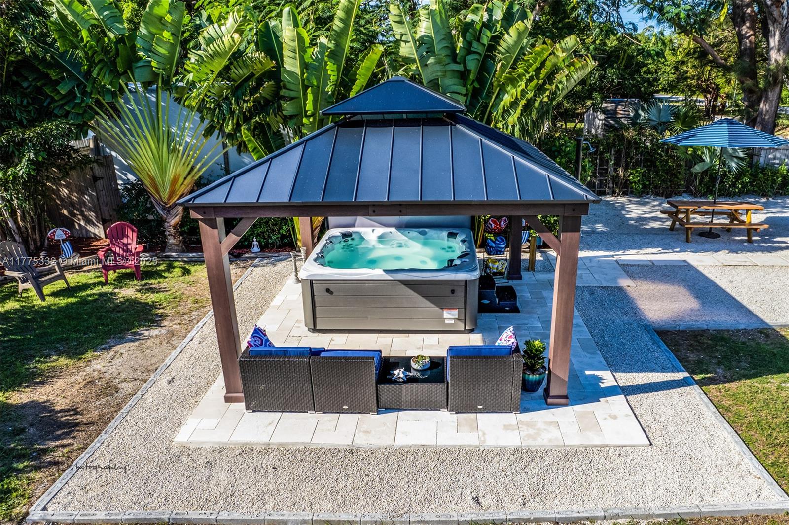 This beautifully updated 3-bedroom, 2.5-bathroom residence boasts modern finishes and an open floor plan, situated on two spacious lots. The master bedroom on the second floor features a private deck, perfect for morning coffee or sunset views. Step into your private oasis with a jacuzzi, ping pong table, tiki bar, and outdoor fireplace, ideal for morning relaxation or evening gatherings. Enjoy the best of Florida living in a fully renovated home that blends luxury and comfort. With ample space for on-site boat parking and outdoor activities, this home offers both accessibility and security. Don’t miss this unique opportunity to own a piece of paradise in the heart of the Keys!