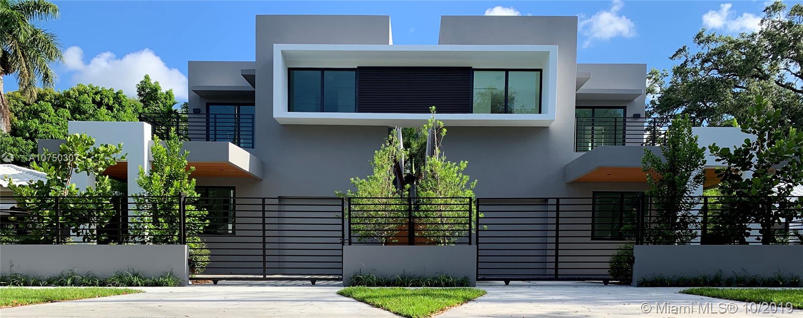 Urban living at its best! Unique 5Bed/6Bath free-standing, new construction, modern townhouse in the heart of Coconut Grove! Meticulously built with top of the line finishes. Perfect for the most discerning buyer. 4 bedrooms & 4 bathrooms upstairs & 1 bedroom with full bathroom on the 1st floor plus a 6th full (cabana/guest) bathroom. Open kitchen with sleek Italian cabinetry w/island bar seating. High-end European appliances, plumbing, bathroom fixtures and cabinetry throughout. LED lighting, Ethernet wired, alarm system w security cameras. Fabulous outdoor entertaining with expansive covered terrace featuring a well equipped summer kitchen and oversized water pool, Luscious landscaping (w sprinkler system) includes bamboo trees & palms plus perimeter concrete wall for plenty of privacy.