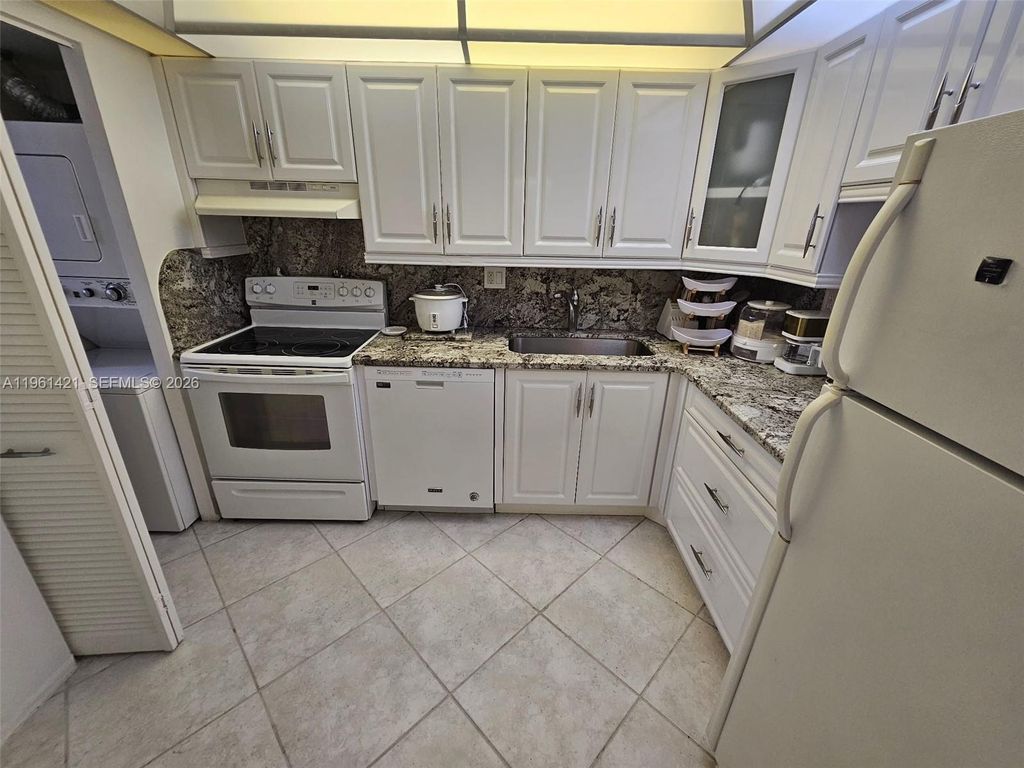 Photo of 8020 N Colony Cir N #103, Tamarac, FL 33321 (MLS # A11961421)