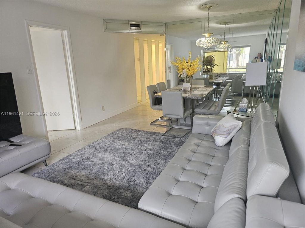 Photo of 8020 N Colony Cir N #103, Tamarac, FL 33321 (MLS # A11961421)