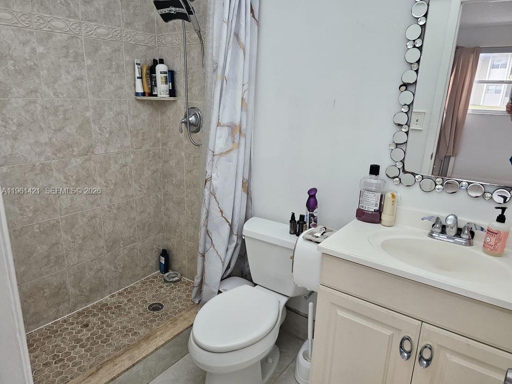 Photo of 8020 N Colony Cir N #103, Tamarac, FL 33321 (MLS # A11961421)