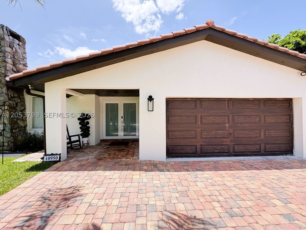 Photo of 10950 SW 40th Ct, Davie, FL 33328 (MLS # A12053799)