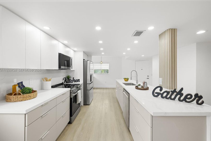 Beautifully renovated 2 bedroom, 2 bath residence overlooking lush garden views. The open contemporary kitchen offers tall modern cabinetry, quartz countertops and new stainless steel appliances. New vinyl flooring, freshly painted interiors  and stylishly remodeled bathrooms add a clean, elegant feel throughout. The A/C was replaced in 2020. A Brand new, big-size washer and dryer and a tankless water heater provide modern comfort and efficiency. Relax while taking in beautiful views and enjoy the convenience of a corner unit with more windows and lighting throughout. HOA fees are $563/month (includes water cable, internet and master insurance) plus $291/month for spectacular million-dollar clubhouse with endeless activities, golf course, teather, bus shutter and much more! Situated in Ivanhoe III at Century Village, a premier 55+ community in Pembroke Pines, close to shopping, entertainment, and major highways.