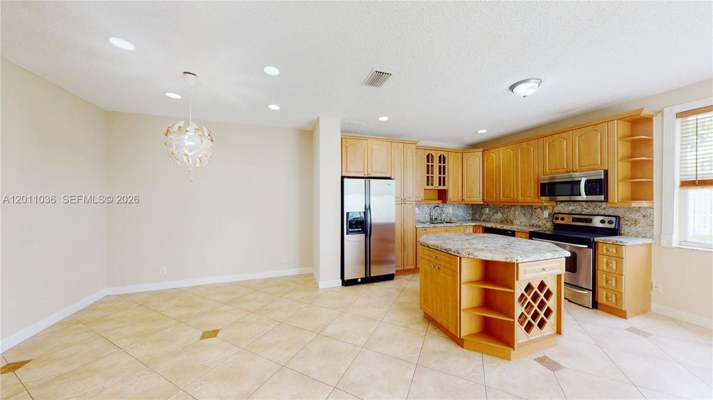 Photo of 897 Briar Ridge Rd #897, Weston, FL 33327 (MLS # A12011036)