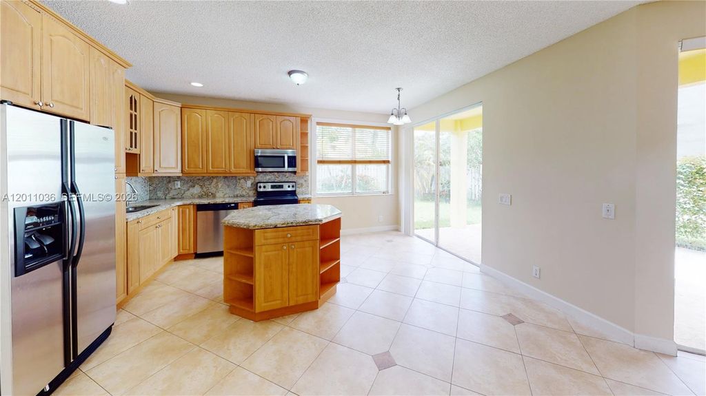 Photo of 897 Briar Ridge Rd #897, Weston, FL 33327 (MLS # A12011036)