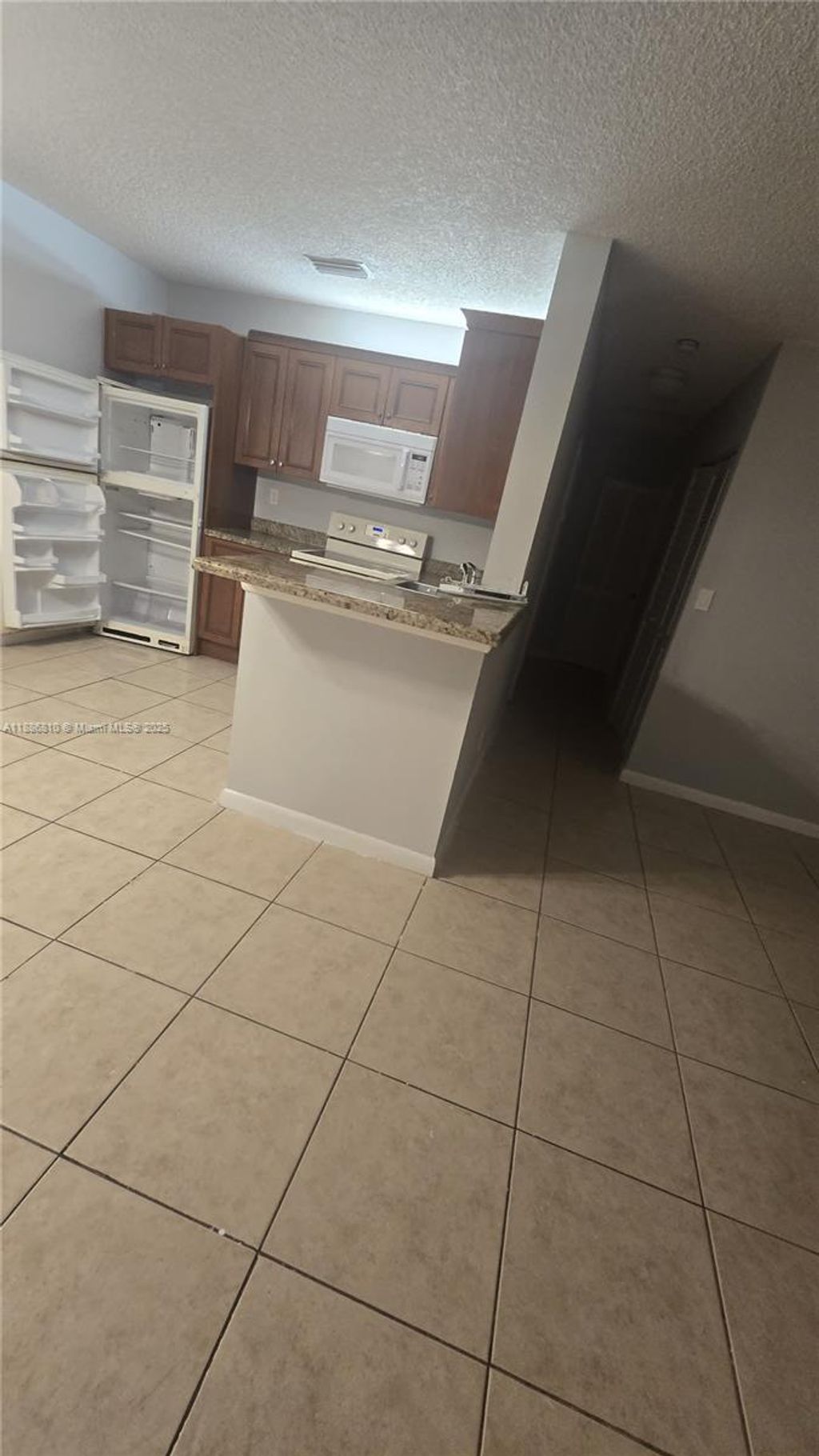 Photo of 11483 NW 42nd St #11483, Coral Springs, FL 33065 (MLS # A11886810)