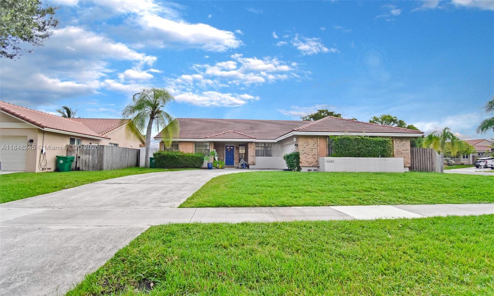 Welcome to this charming corner-lot home in the heart of Hawkes Bluff, ideally located adjacent to Weston and SW Ranches. Sitting on an oversized 11,116 SF lot, this well-maintained home offers 3 bed, 2 bath, 2,116 SF of interior living space with a split floor plan, soaring vaulted ceilings, and a bright layout featuring an updated primary bedroom and bathroom. The expansive backyard has plenty of room to add your dream pool, along with a covered patio and built-in BBQ. A large driveway provides ample parking. Quiet neighborhood with low HOA. Ideally located near top-rated schools, major highways, shopping, and dining. Make this your home before it’s gone. Schedule your showing today!