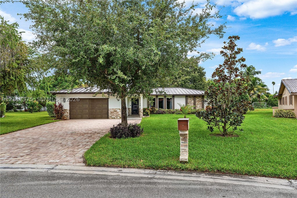 Photo of 10936 NW 41st Dr, Coral Springs, FL 33065 (MLS # A12112375)